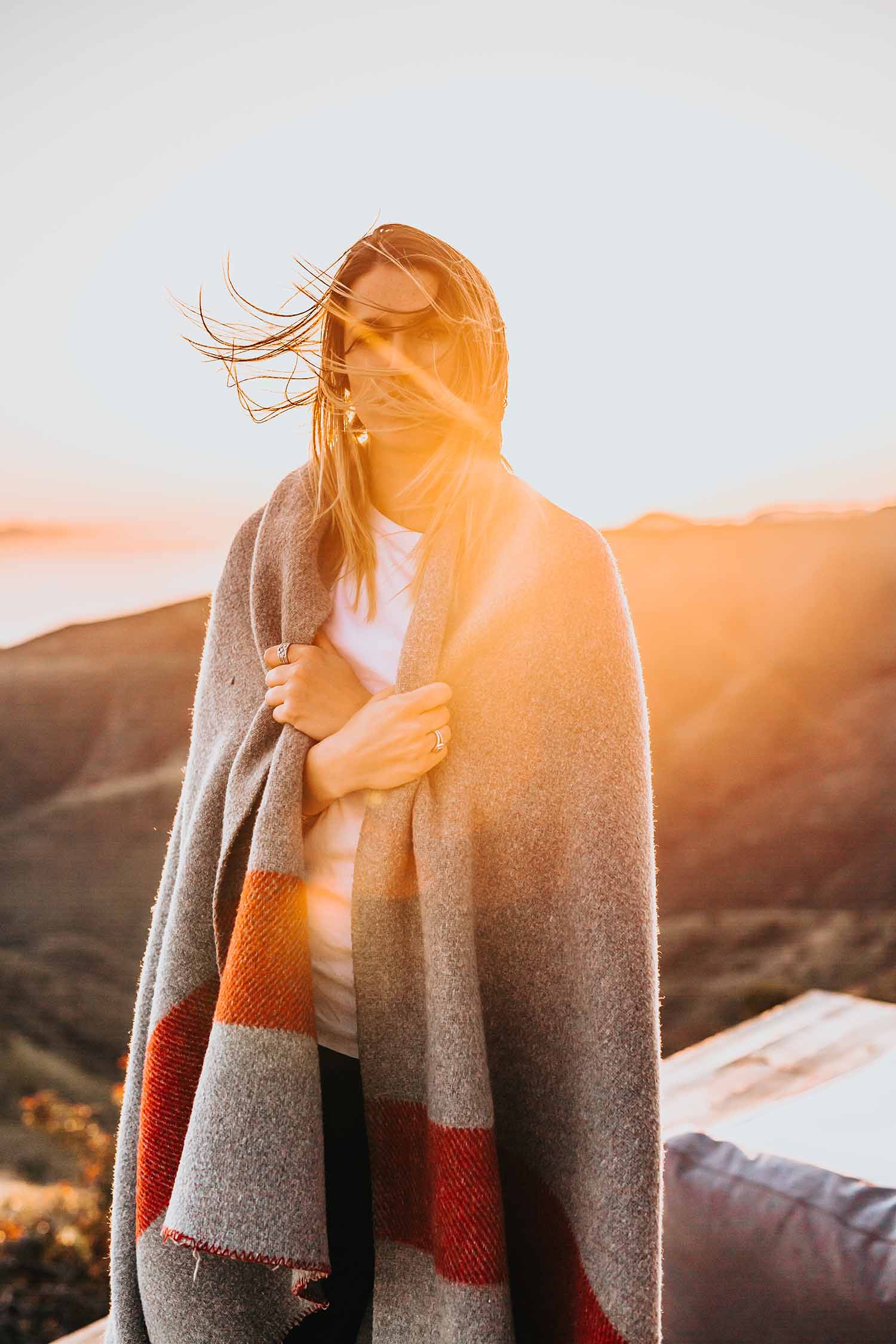 Portrait of woman in fleece on mountain